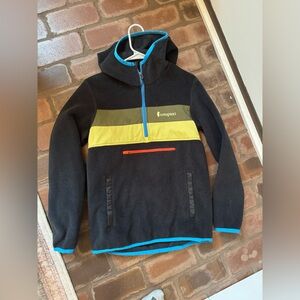 Cotopaxi Kids Jacket in Black, Yellow, and Blue